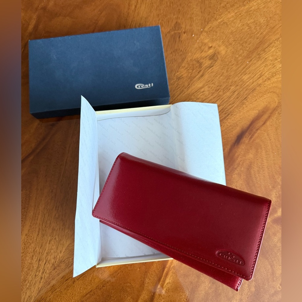 New without tags leather wallet in red colour by Cresti.
Made in Europe 7”x4”